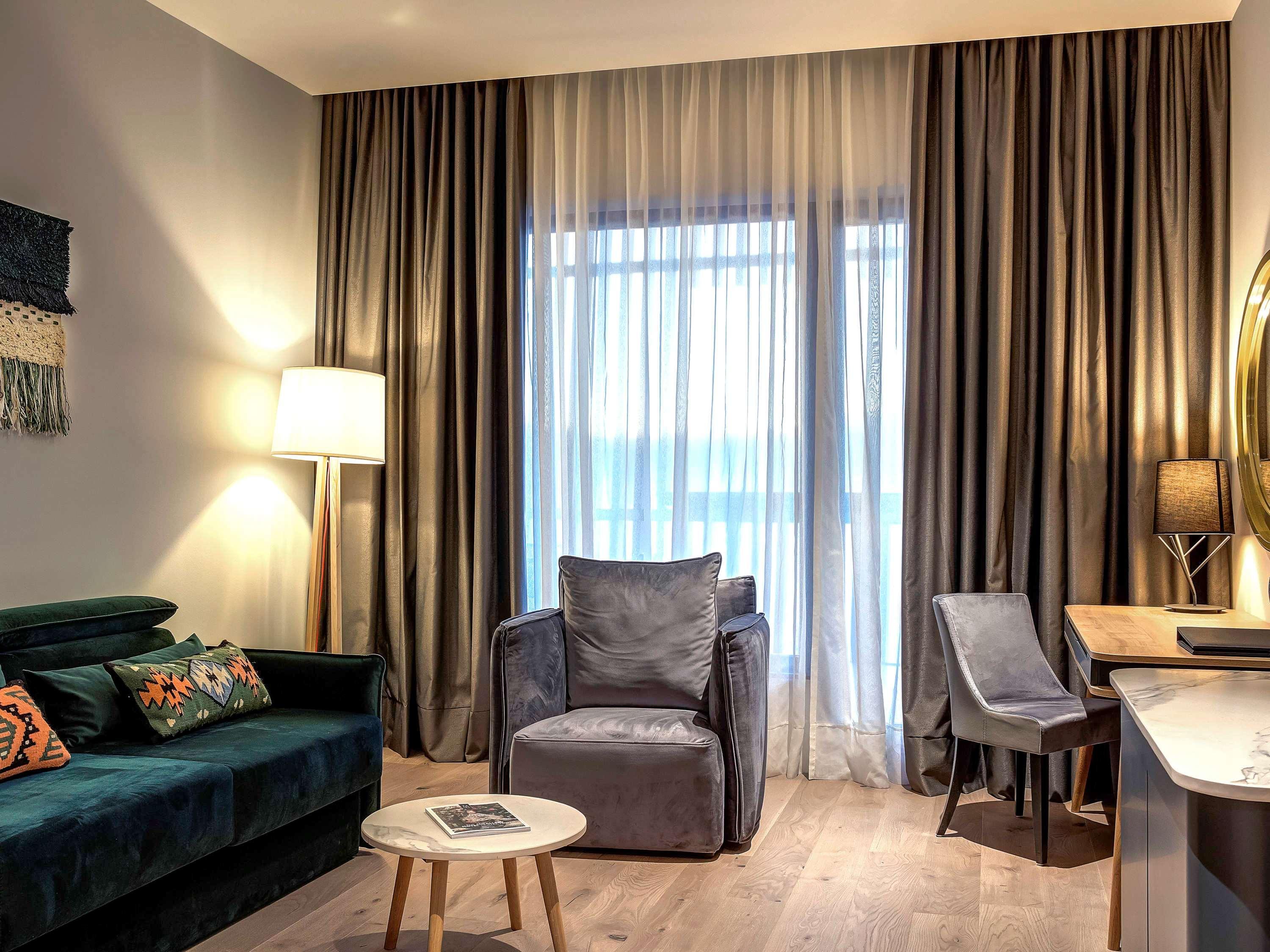 美憬阁水疗度假村-塞拉耶佛塔尔琴森林 Tarcin 外观 照片 A living room in a hotel